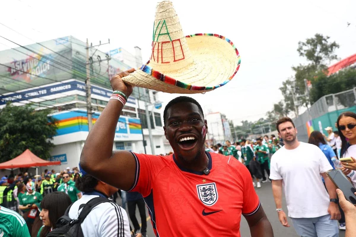 Fan in England jersey celebrating with sombrero