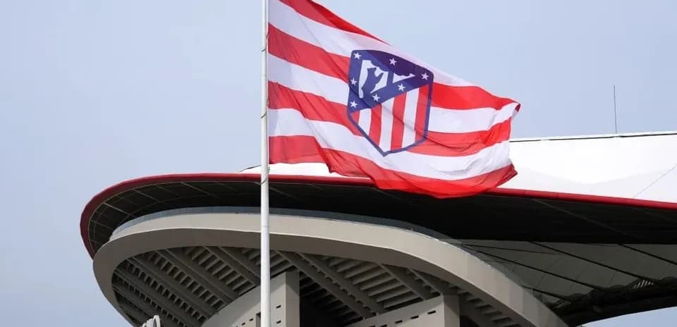 Atletico Madrid flag flying outside stadium