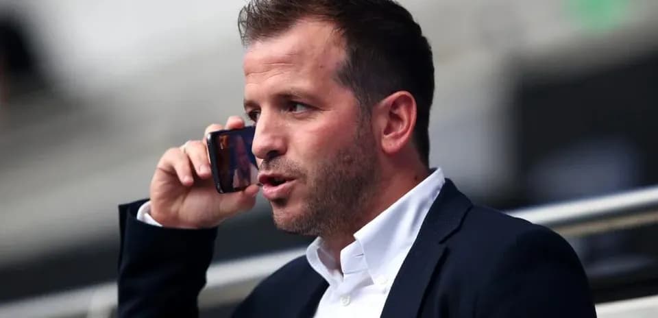 Man in suit talking on mobile phone