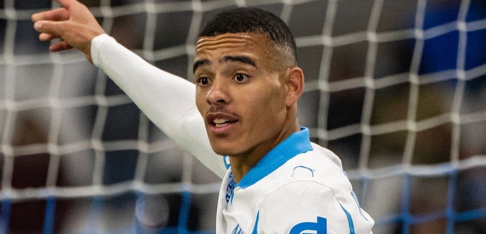 Player celebrating a goal on the pitch