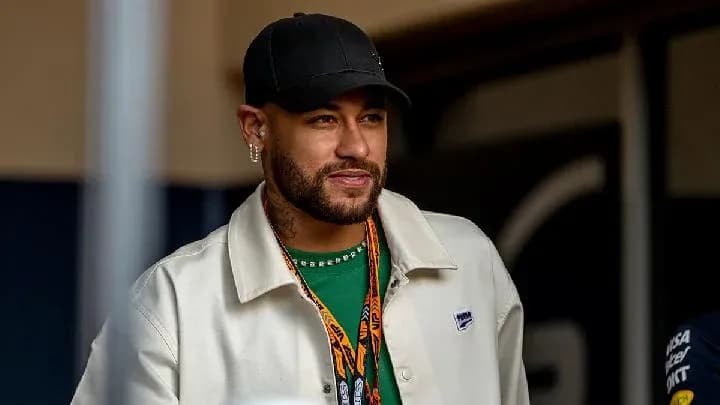 Man wearing a cap and jacket at event