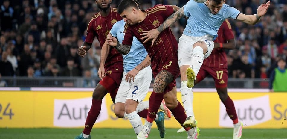 Players competing for the ball during AS Roma vs Lazio