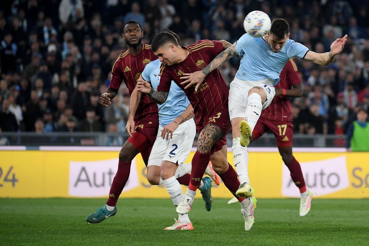 Players competing for the ball during AS Roma vs Lazio