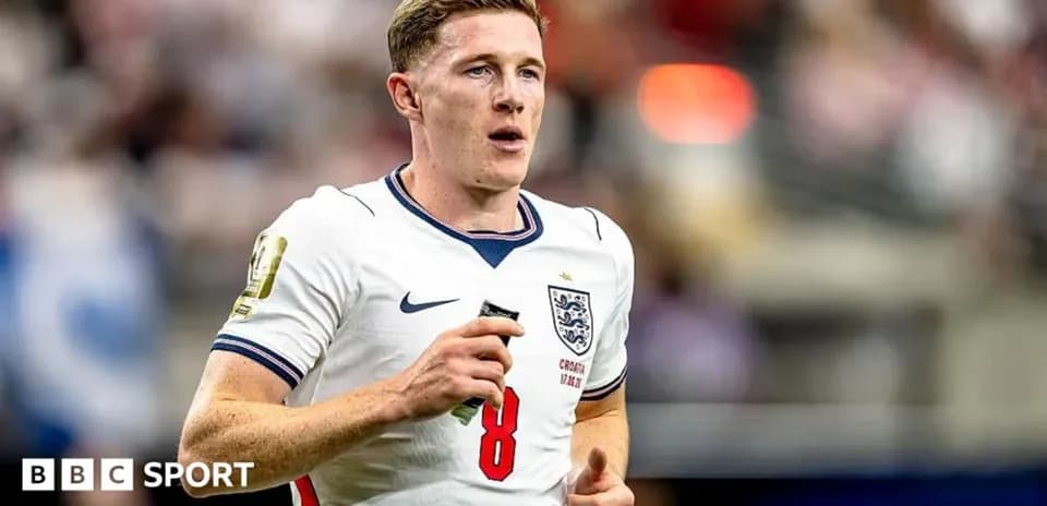 Player running on field in England jersey