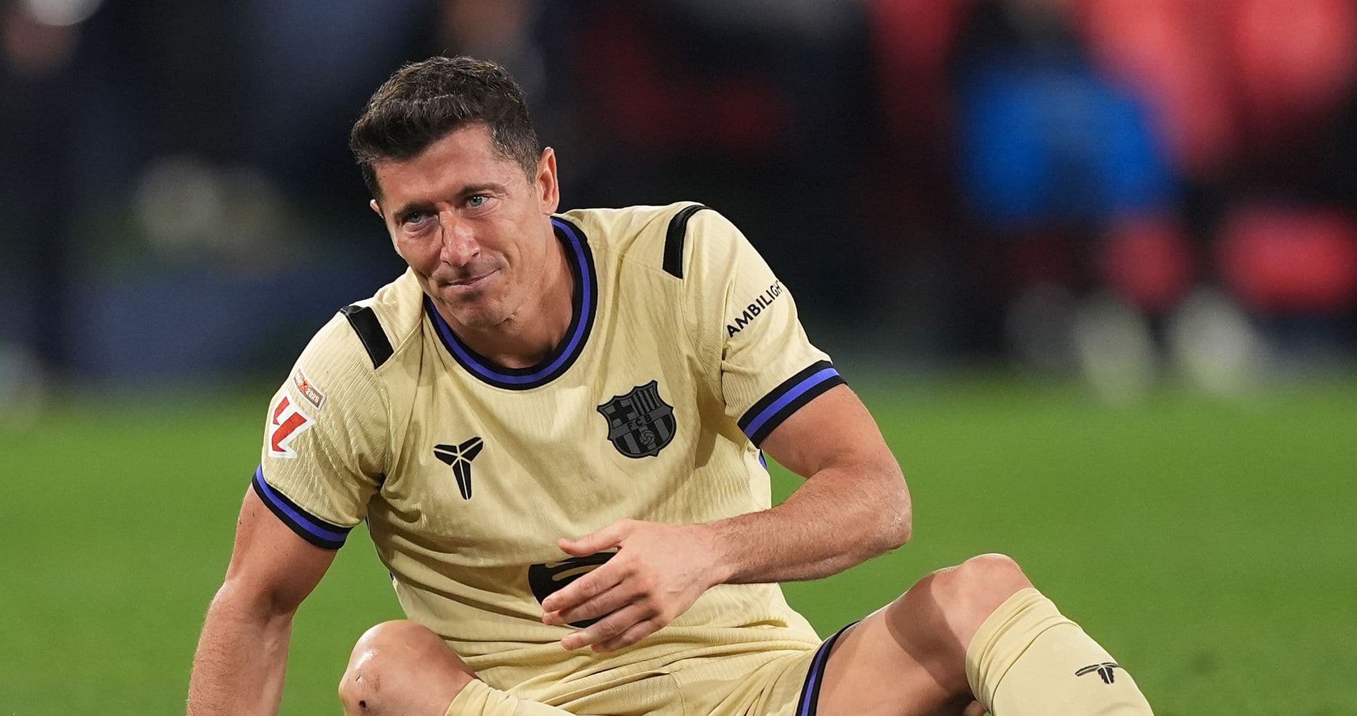 Player sitting on the ground during a match