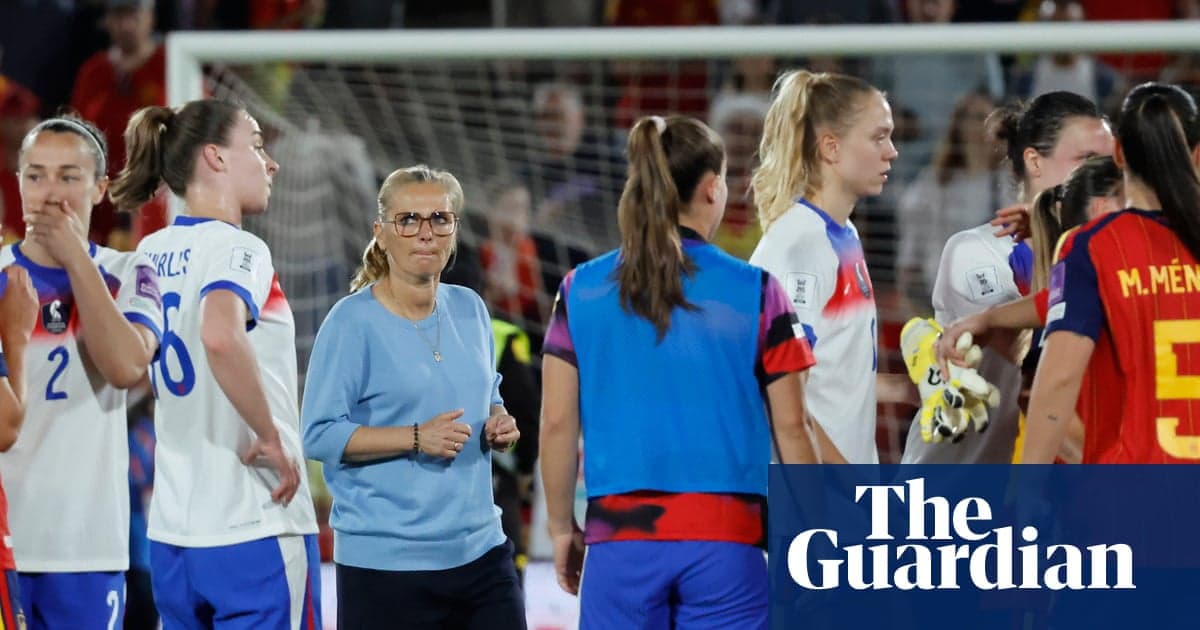 Coaching staff interacting with players after match