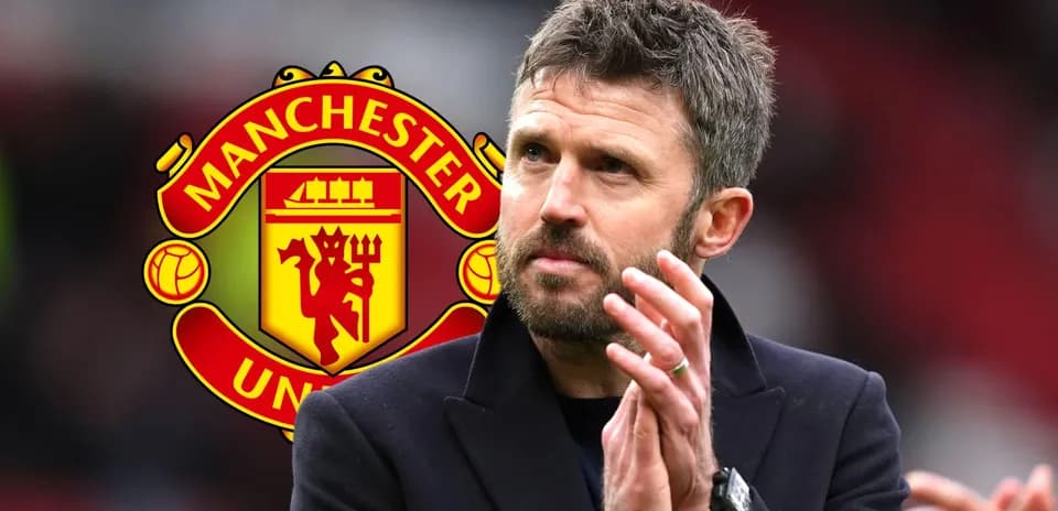 Man applauding in front of Manchester United logo