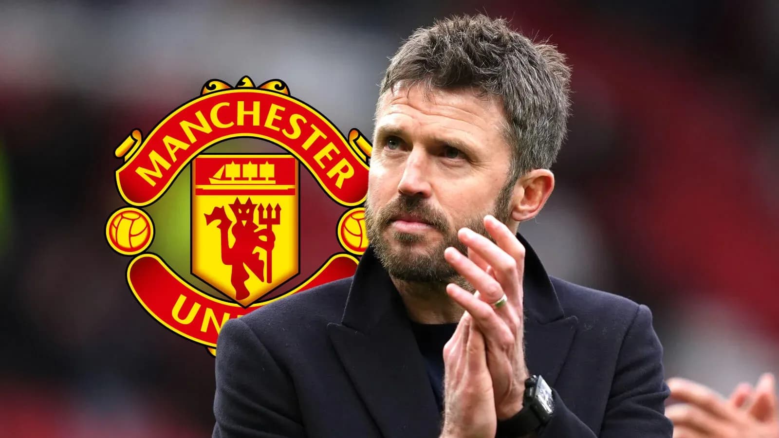 Man applauding in front of Manchester United logo