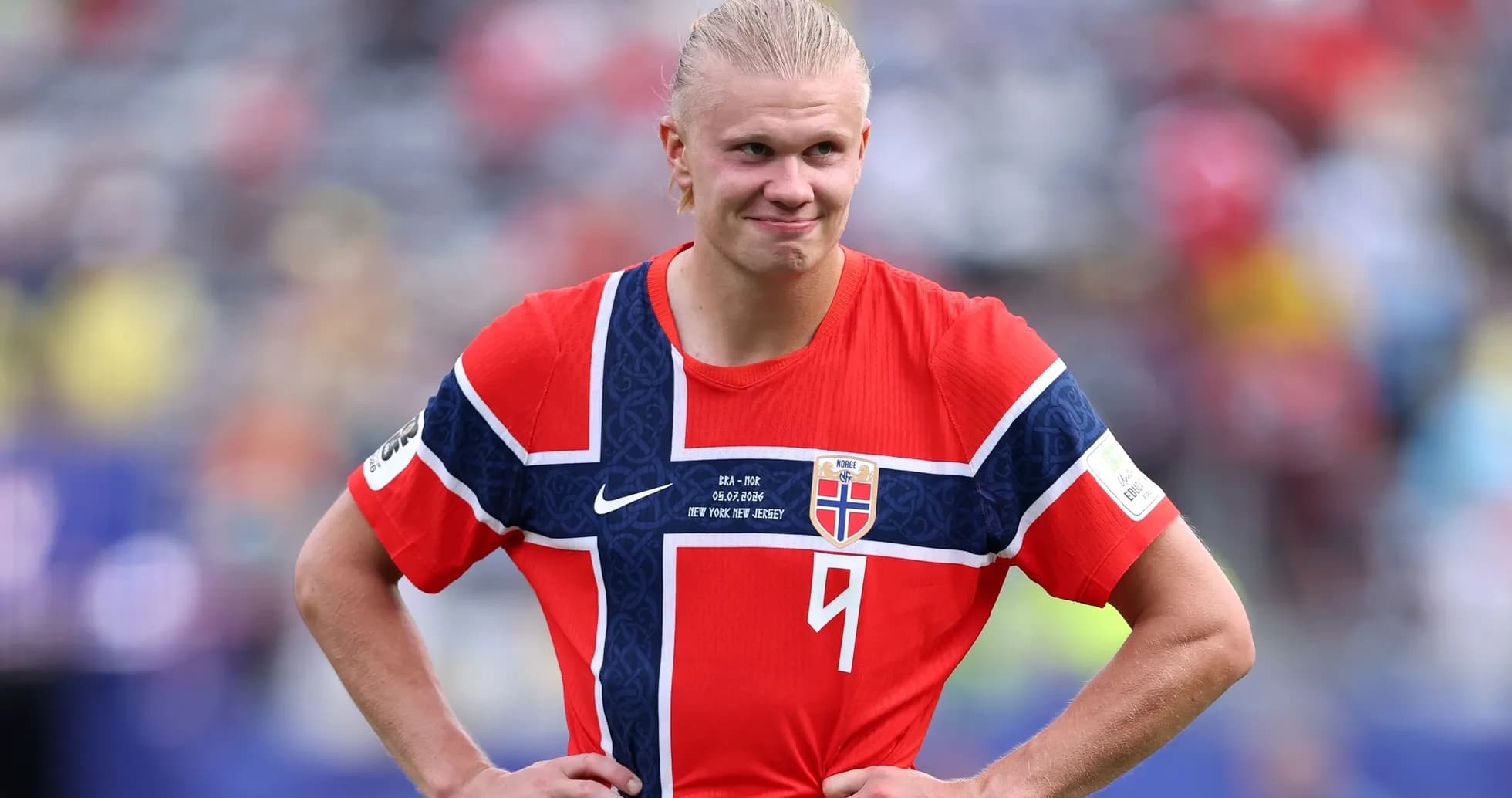 Norway player in red jersey on field