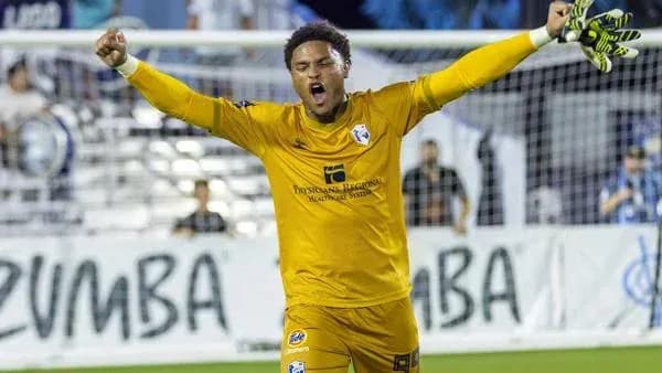 Goalkeeper celebrating a save during the match