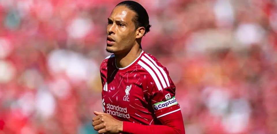 Player in red Liverpool kit during match