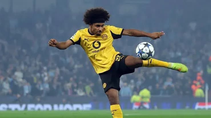 Player kicking the ball during a match