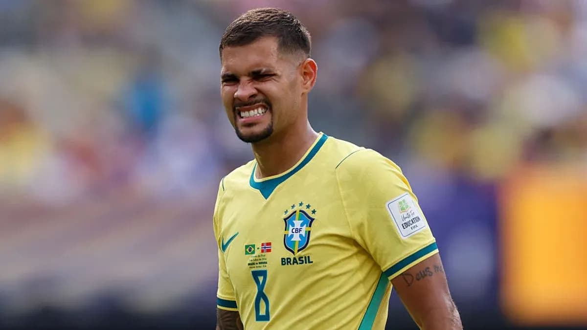 Brazilian player grimacing during match action