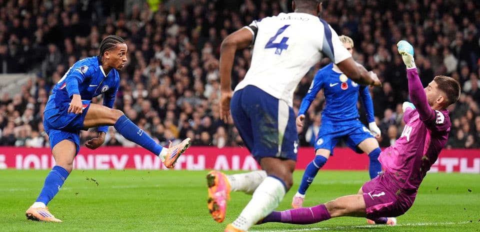 Chelsea player taking a shot on goal