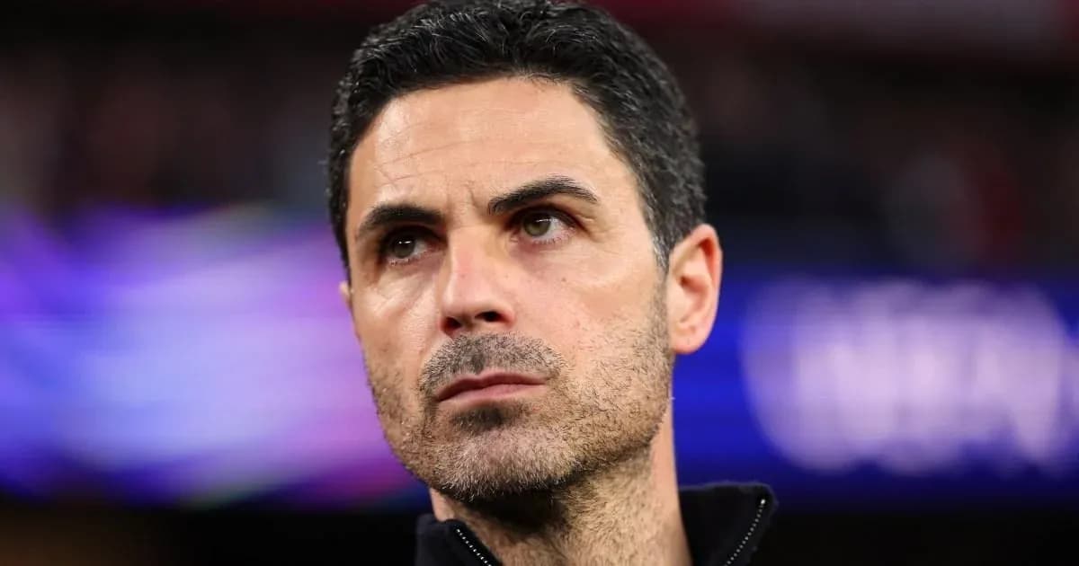 Coach observing from the sidelines during match