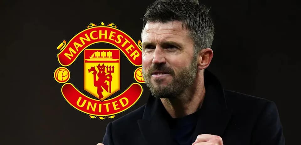 Coach celebrating in front of Manchester United logo
