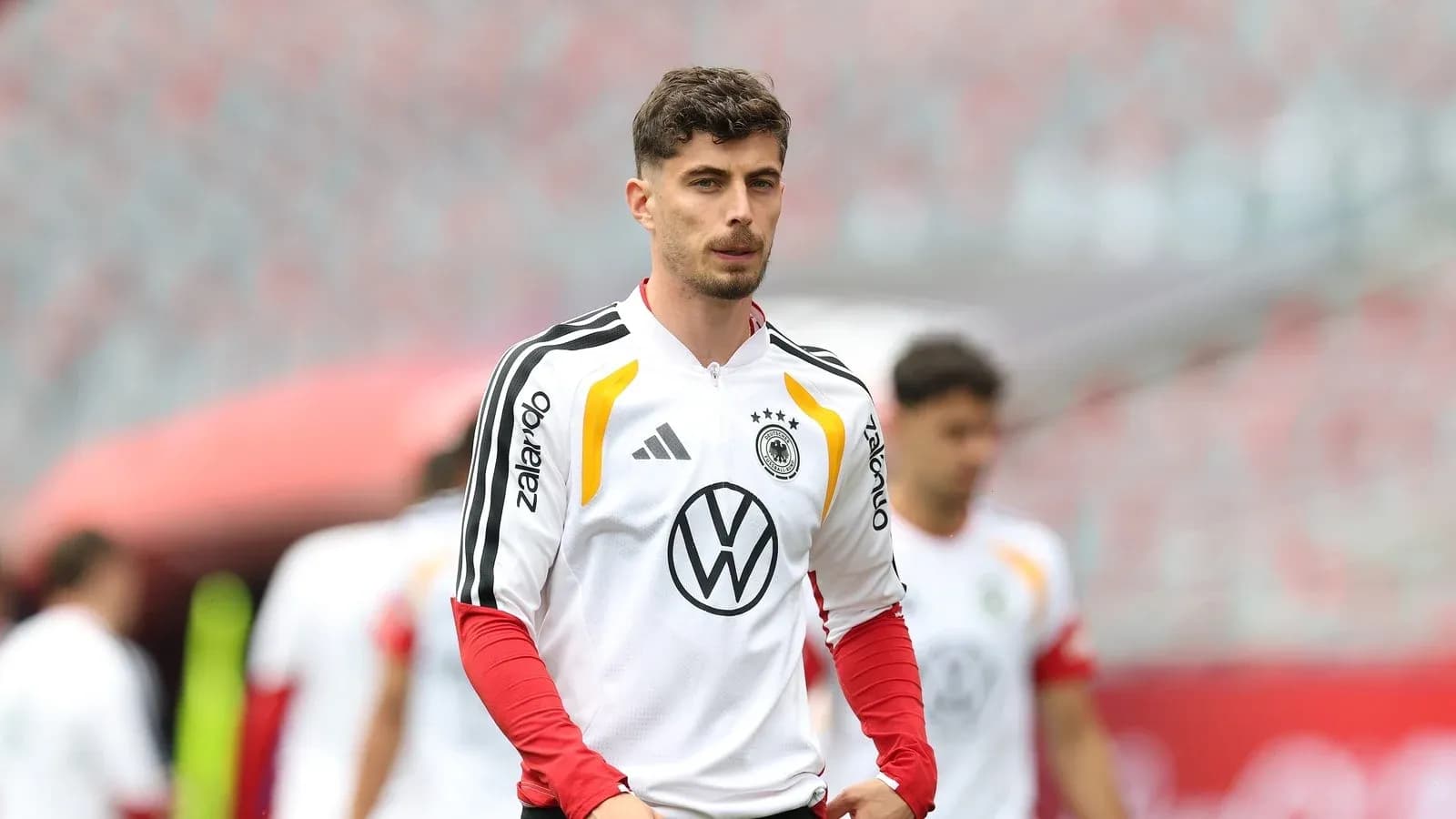 Player in Germany training kit on the pitch