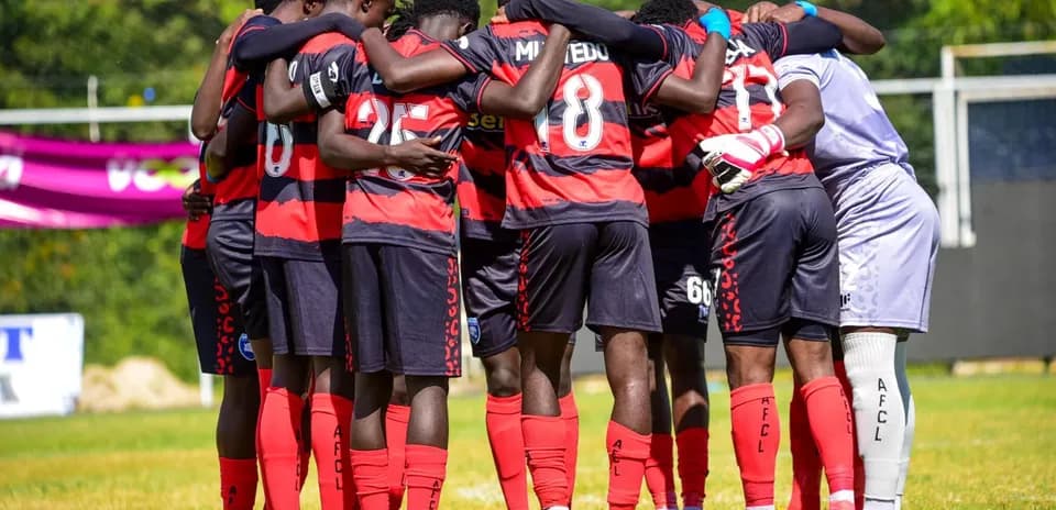 AFCL players huddling before match