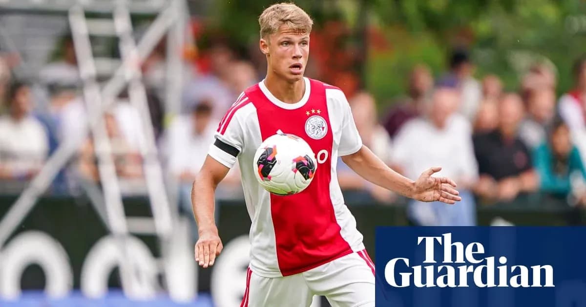 Ajax player controlling the ball during training session