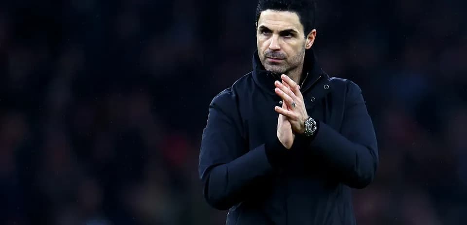 Manager clapping during match at the stadium