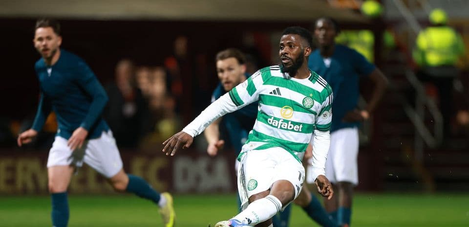 Celtic player passing the ball during match