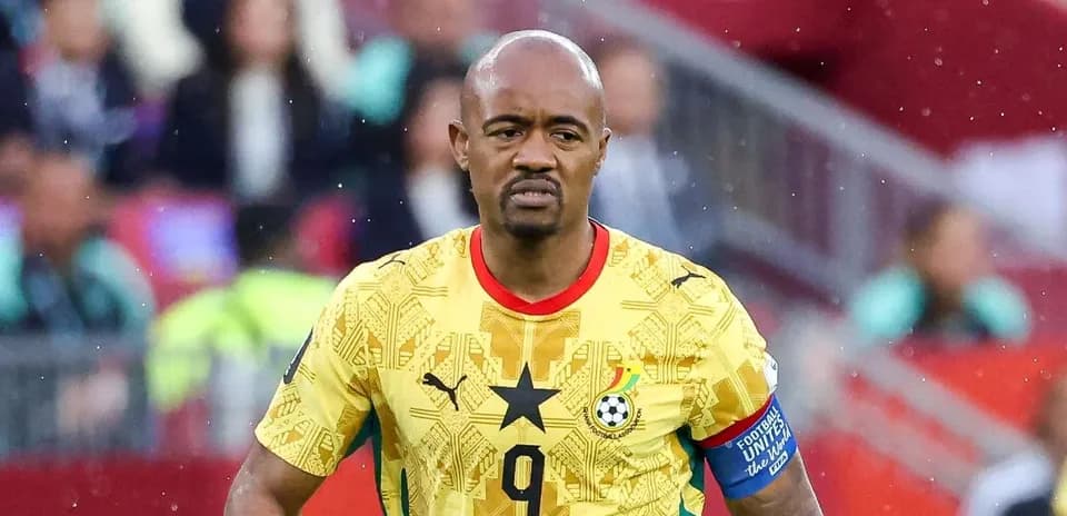 Ghanaian player wearing yellow jersey on field