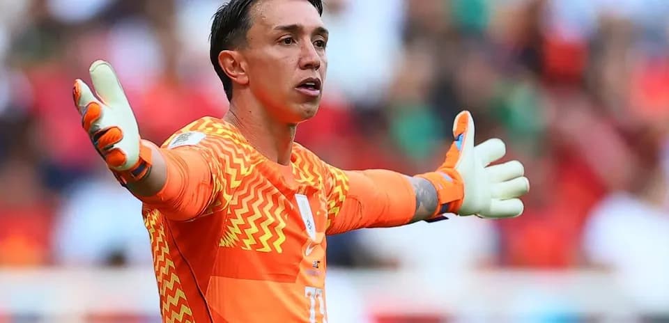 Goalkeeper directing teammates during match play