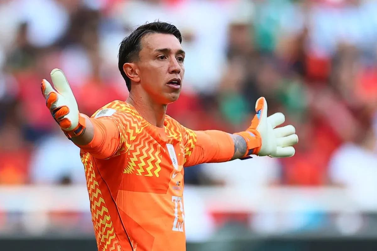 Goalkeeper directing teammates during match play