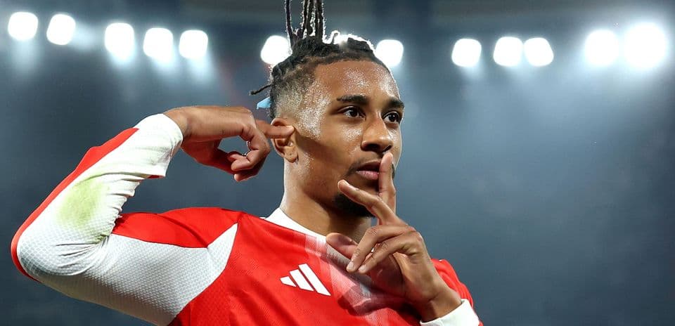 Player celebrating with a finger gesture after scoring
