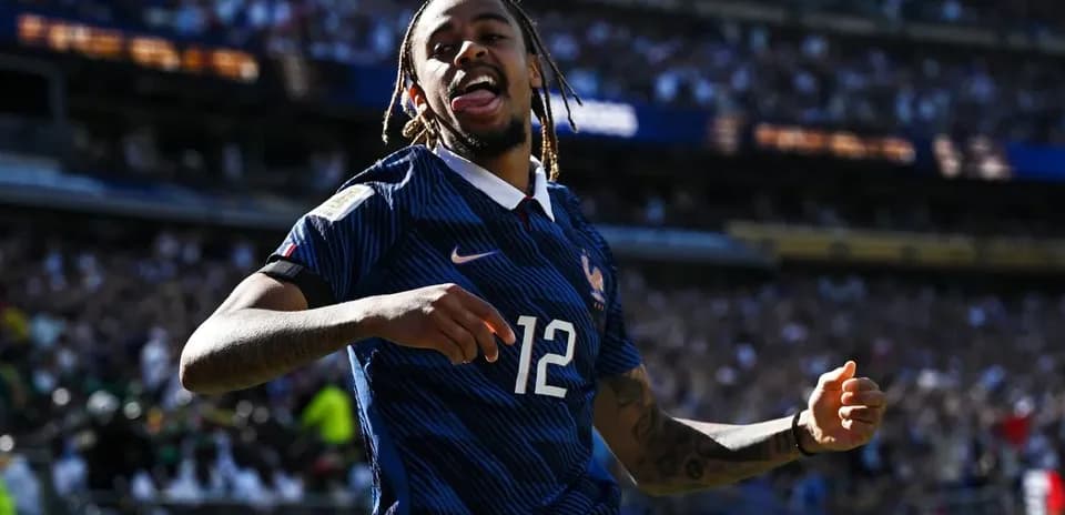 Player celebrating goal in France national team jersey