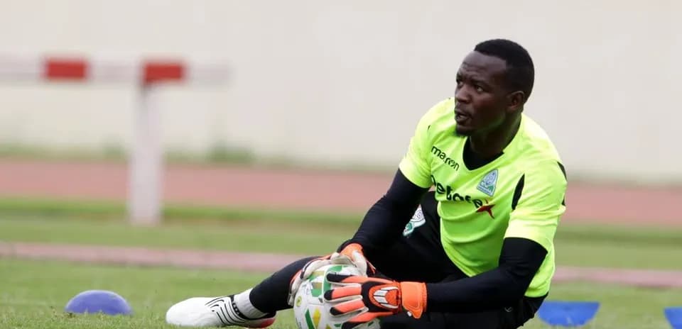 Goalkeeper training, catching the ball on field