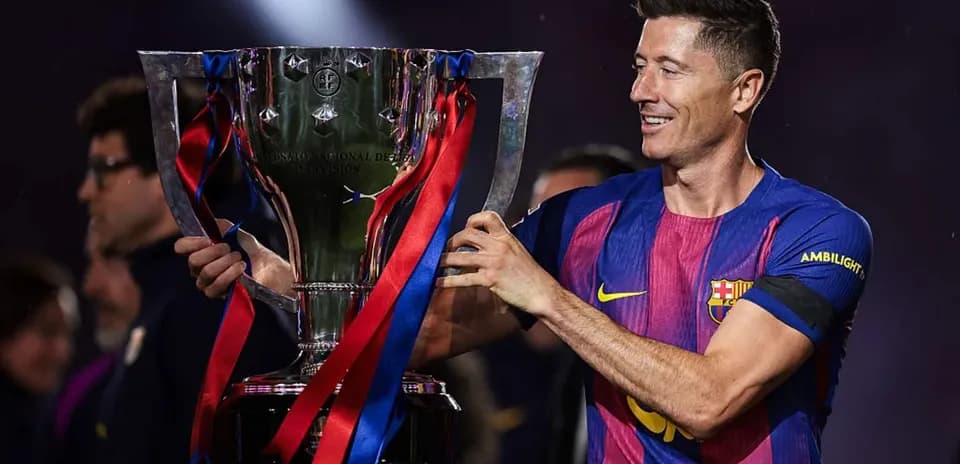 Player holding trophy after match celebration