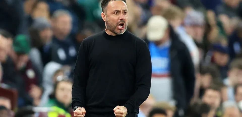 Manager celebrating during intense match moment