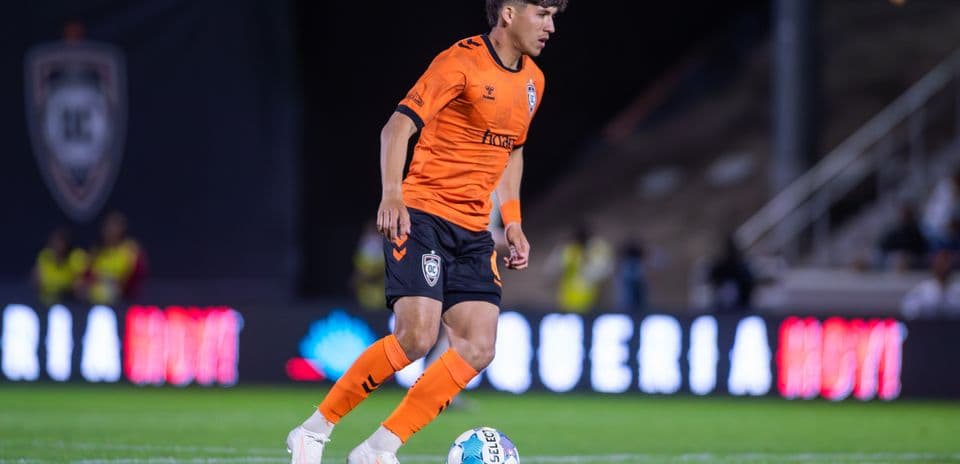 Player dribbling ball during Alta match