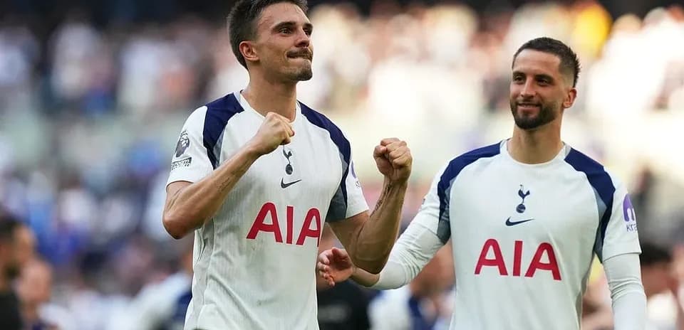 Tottenham players celebrating after a match