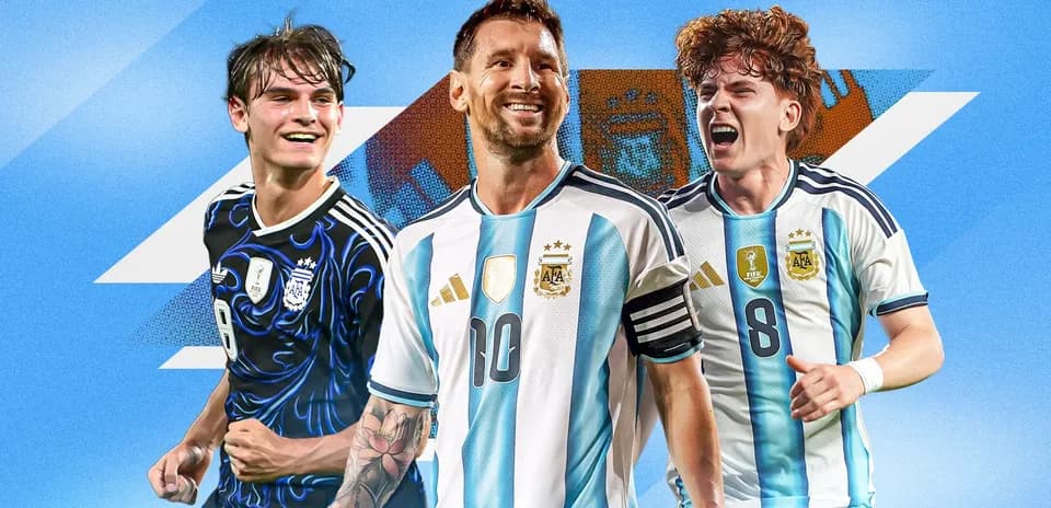 Three Argentine players celebrating in team jerseys