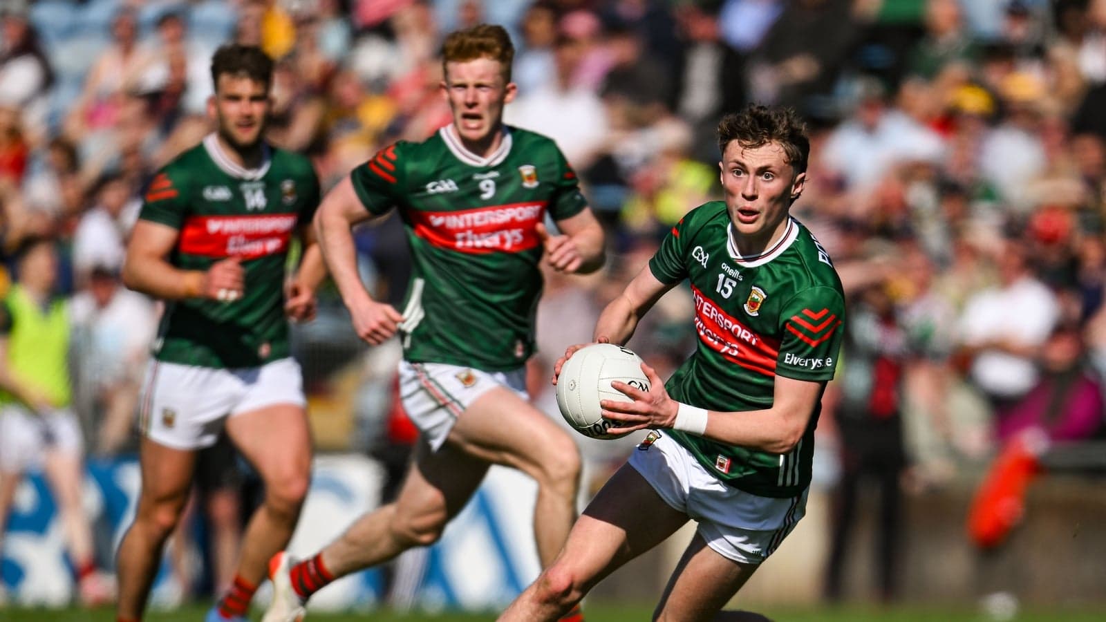 Mayo player running with the ball during a match