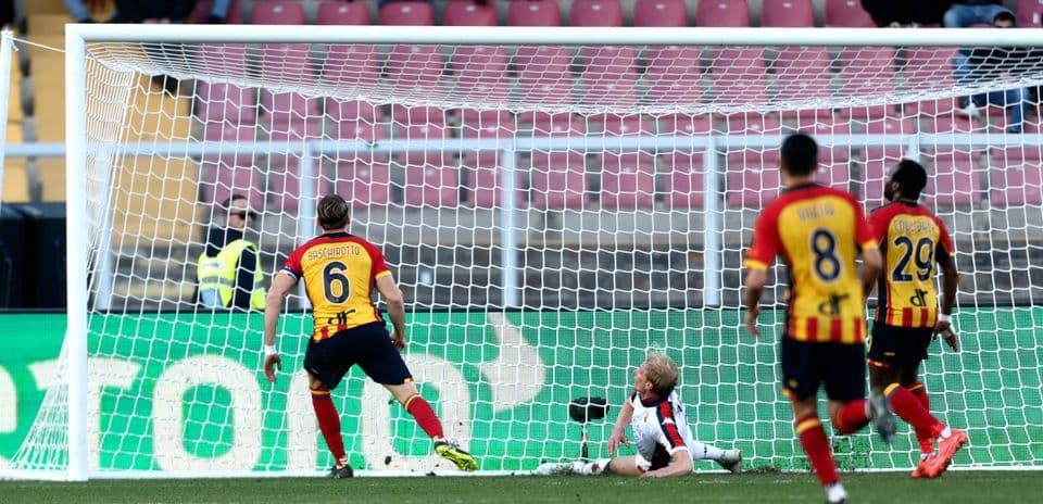 Lecce player reacts after scoring against Genoa
