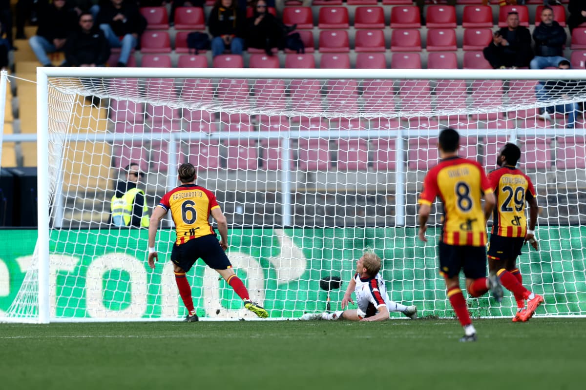 Lecce player reacts after scoring against Genoa