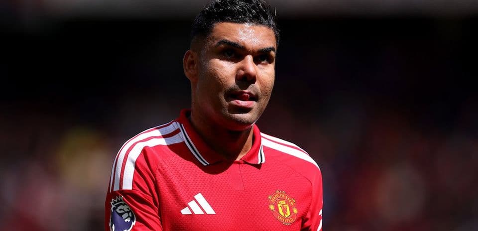 Player in Manchester United kit on the field