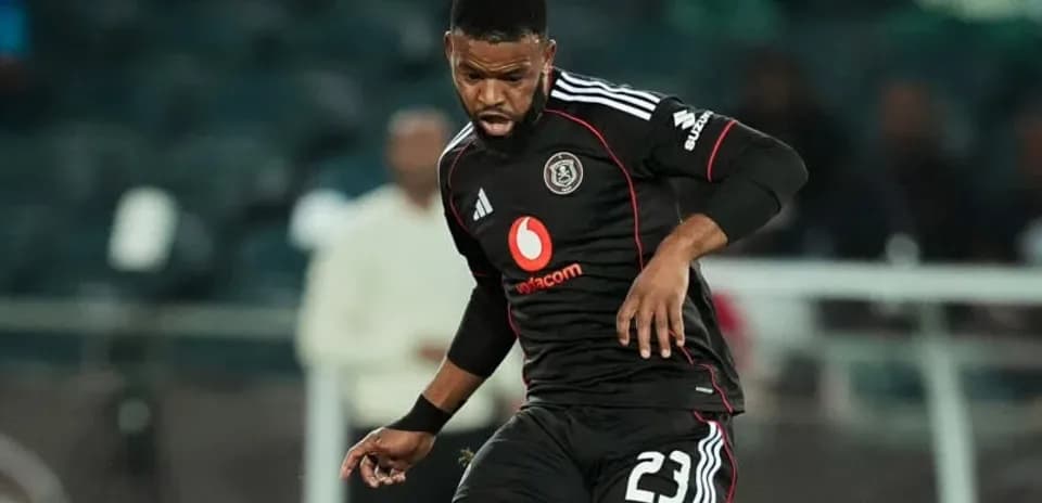 Player in black jersey during football match