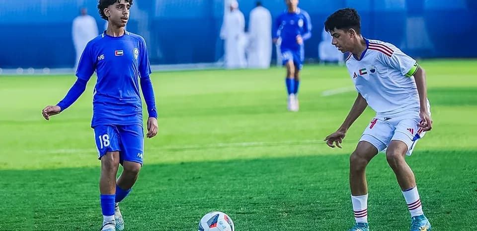 Players from Ittihad Kalba and Al Nasr during match