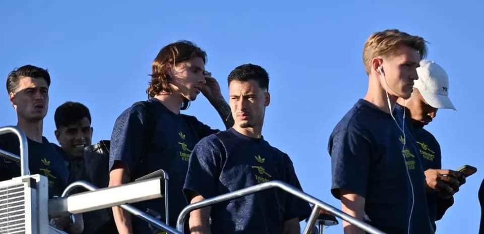 Players walking down steps in training attire