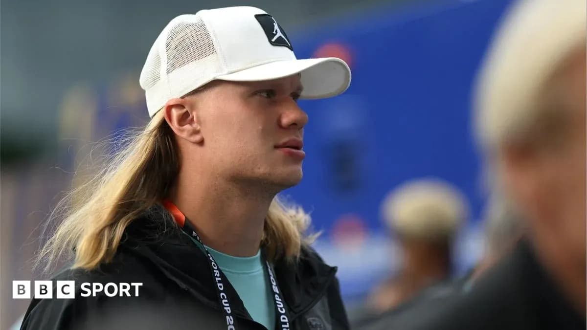 Young man with long hair wearing a white cap