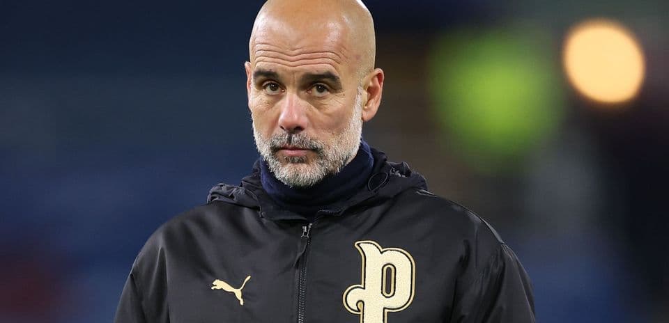 Coach observing during a match on the sidelines