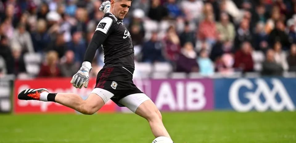 Goalkeeper taking a kick during a match