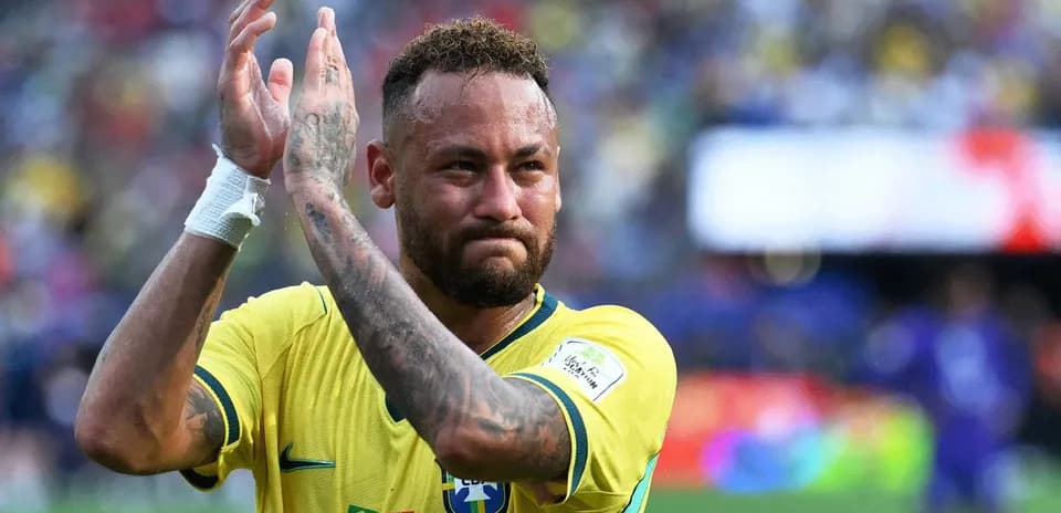 Neymar applauding fans after match in Brazil jersey
