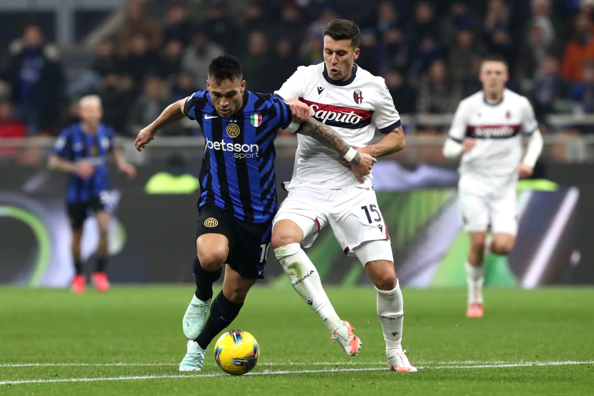 Player tackling opponent during Bologna vs Inter match