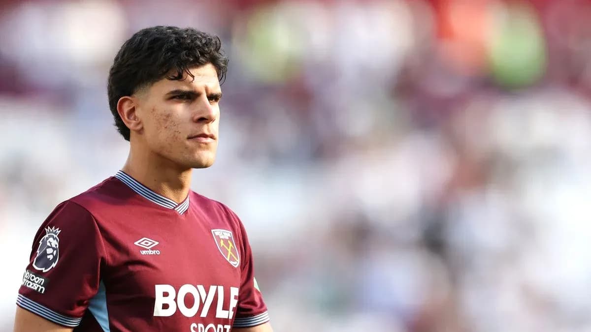 Player in West Ham United kit on the pitch