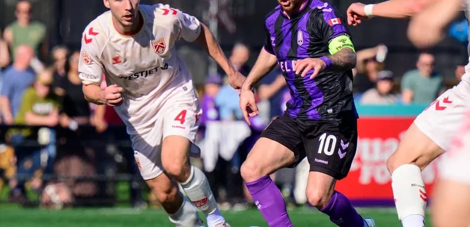 Cavalry FC player challenges Pacific FC player